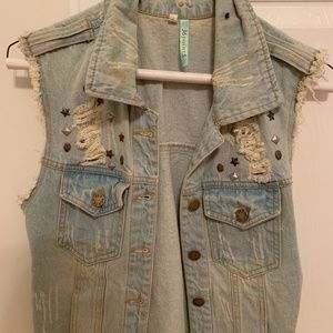 Denim vest with studded stars and skulls